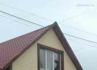 Самостійна установка широких воріт в гараж заміського будинку